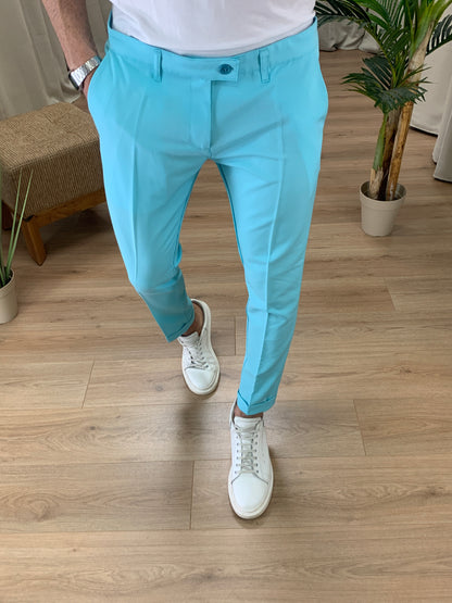 Pantalone Valencia con risvolto col. Turchese