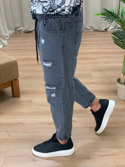 Jeans Walker con elastico in vita e rotture col. Nero