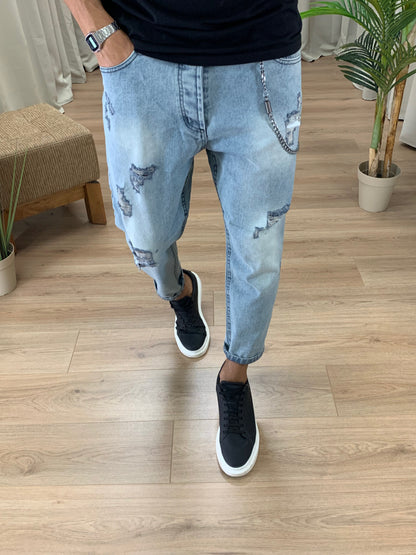 Jeans Mefisto con rotture e catena col. Denim
